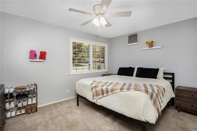 a sink with window and cabinets