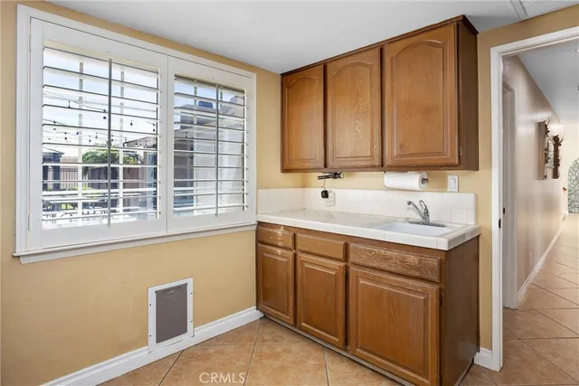 a bed room with a bed and a chandelier