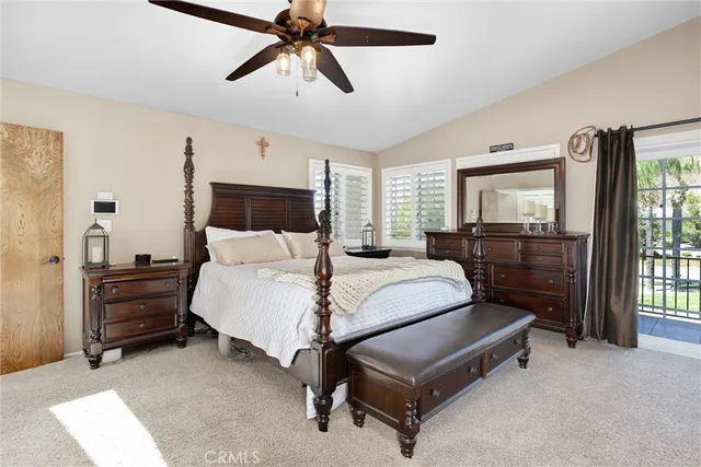 a bedroom with a workspace