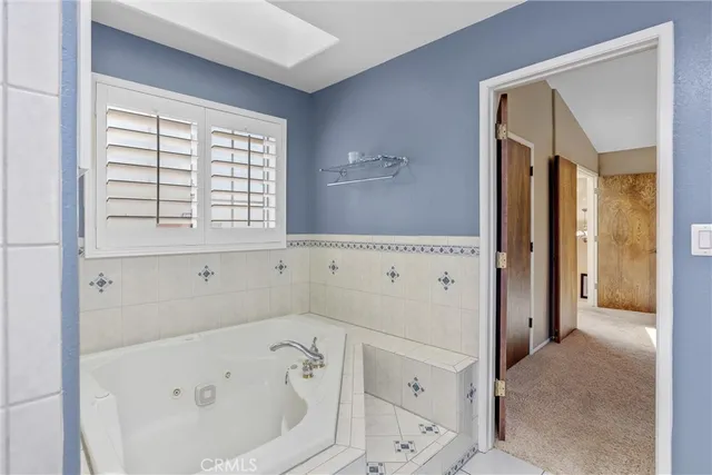 a view of a swimming pool with a yard