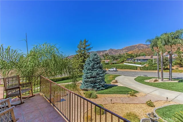 a view of a swimming pool with chairs