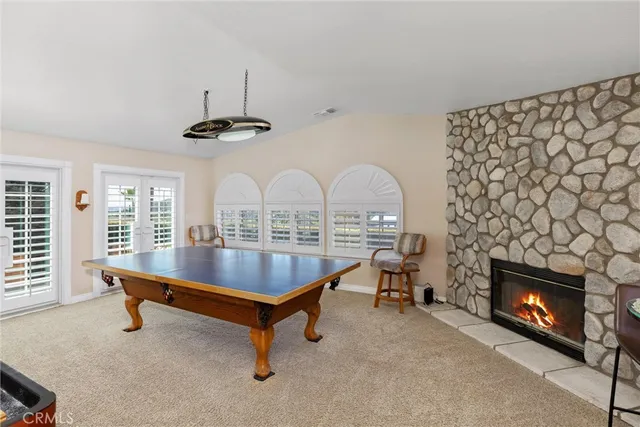 a room with furniture and a fireplace