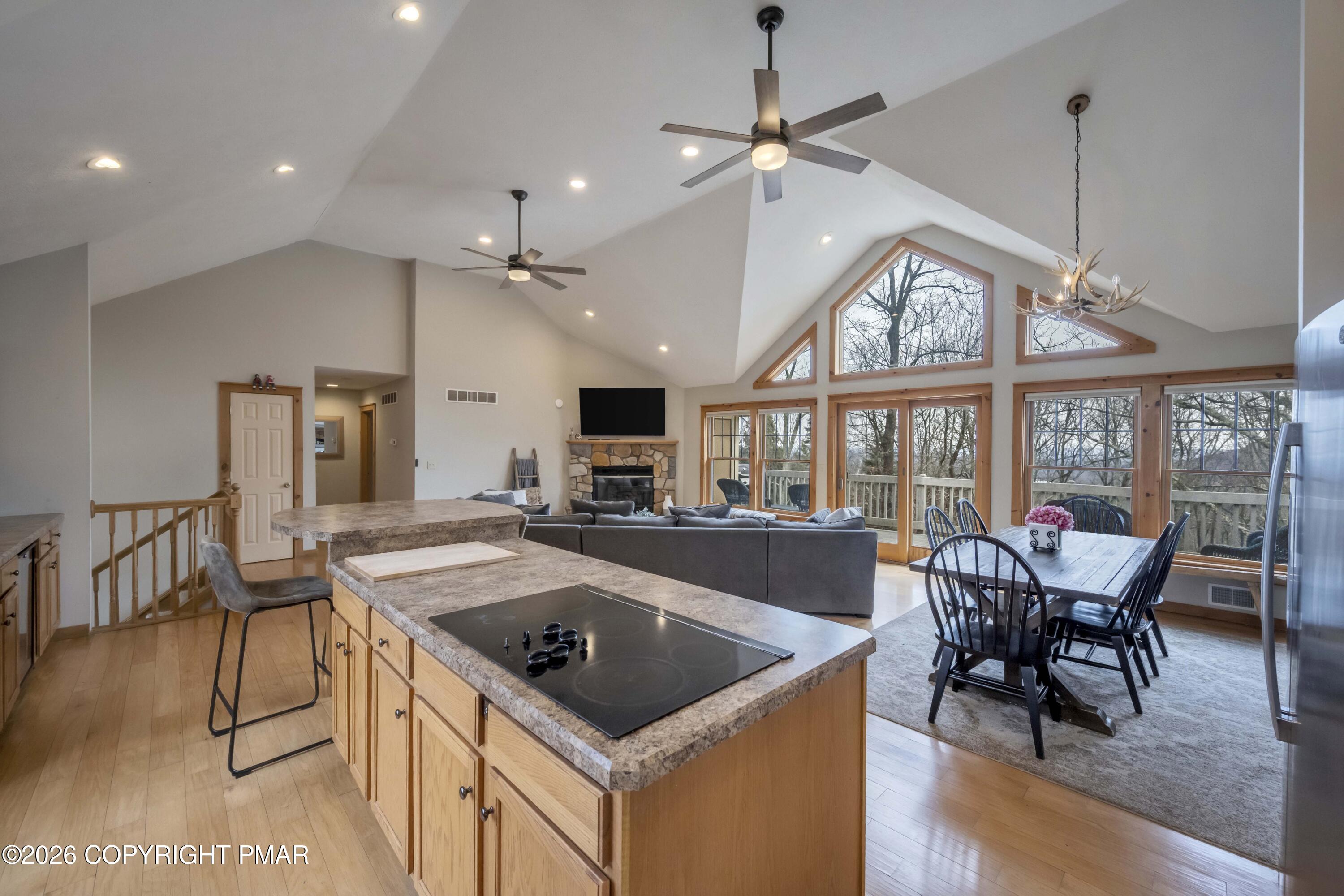 188 Upper Deer Valley Road Tannersville, PA 18372 - Photo 11 of 49 a kitchen with a stove a table and chairs