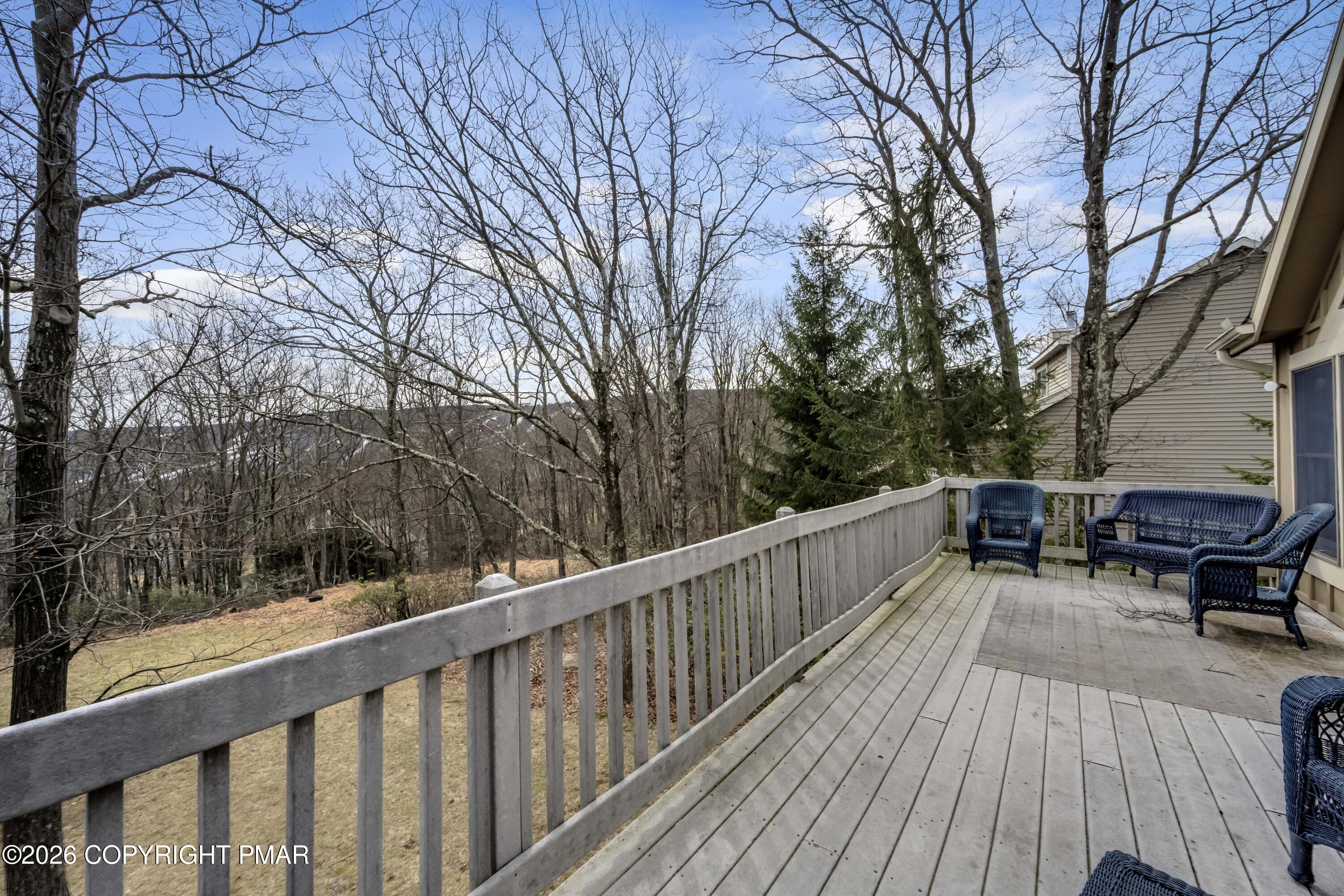 188 Upper Deer Valley Road Tannersville, PA 18372 - Photo 14 of 49 a balcony with wooden floor and wooden fence