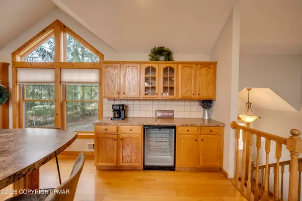 a very nice looking kitchen with a large window
