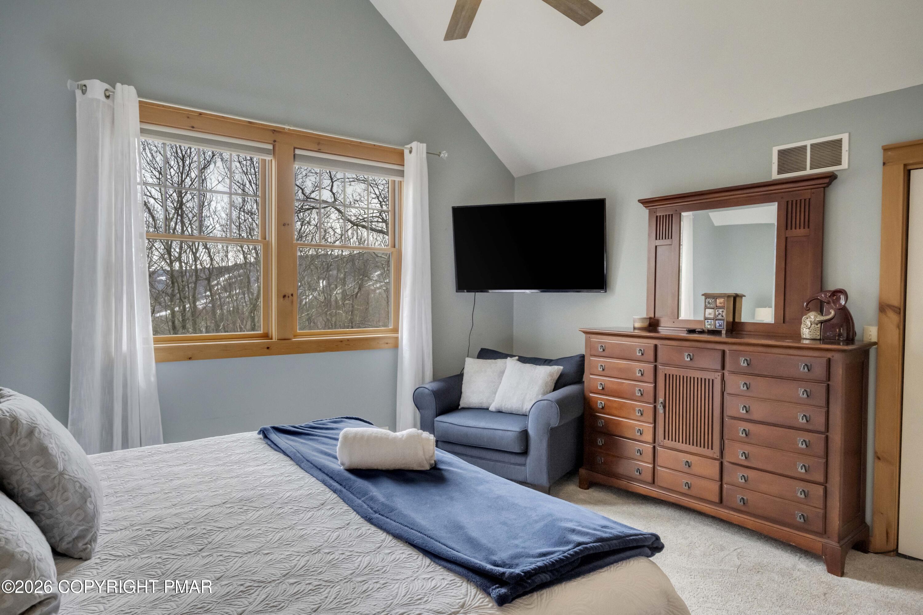 188 Upper Deer Valley Road Tannersville, PA 18372 - Photo 21 of 49 a bedroom with a bed and a flat screen tv