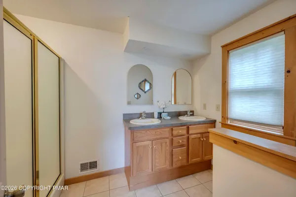 a kitchen with a sink and a stove top oven