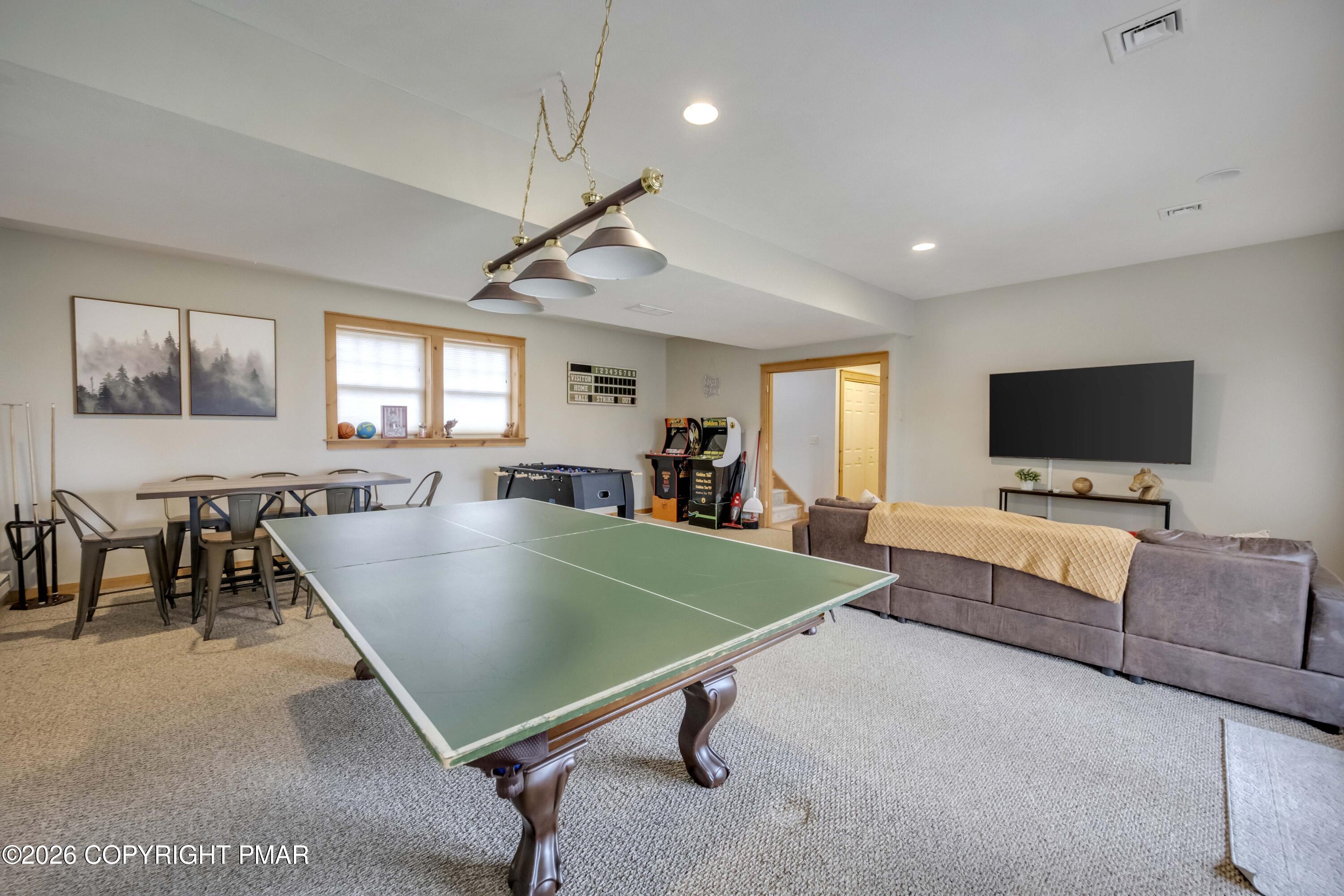 188 Upper Deer Valley Road Tannersville, PA 18372 - Photo 27 of 49 a living room with furniture and a flat screen tv