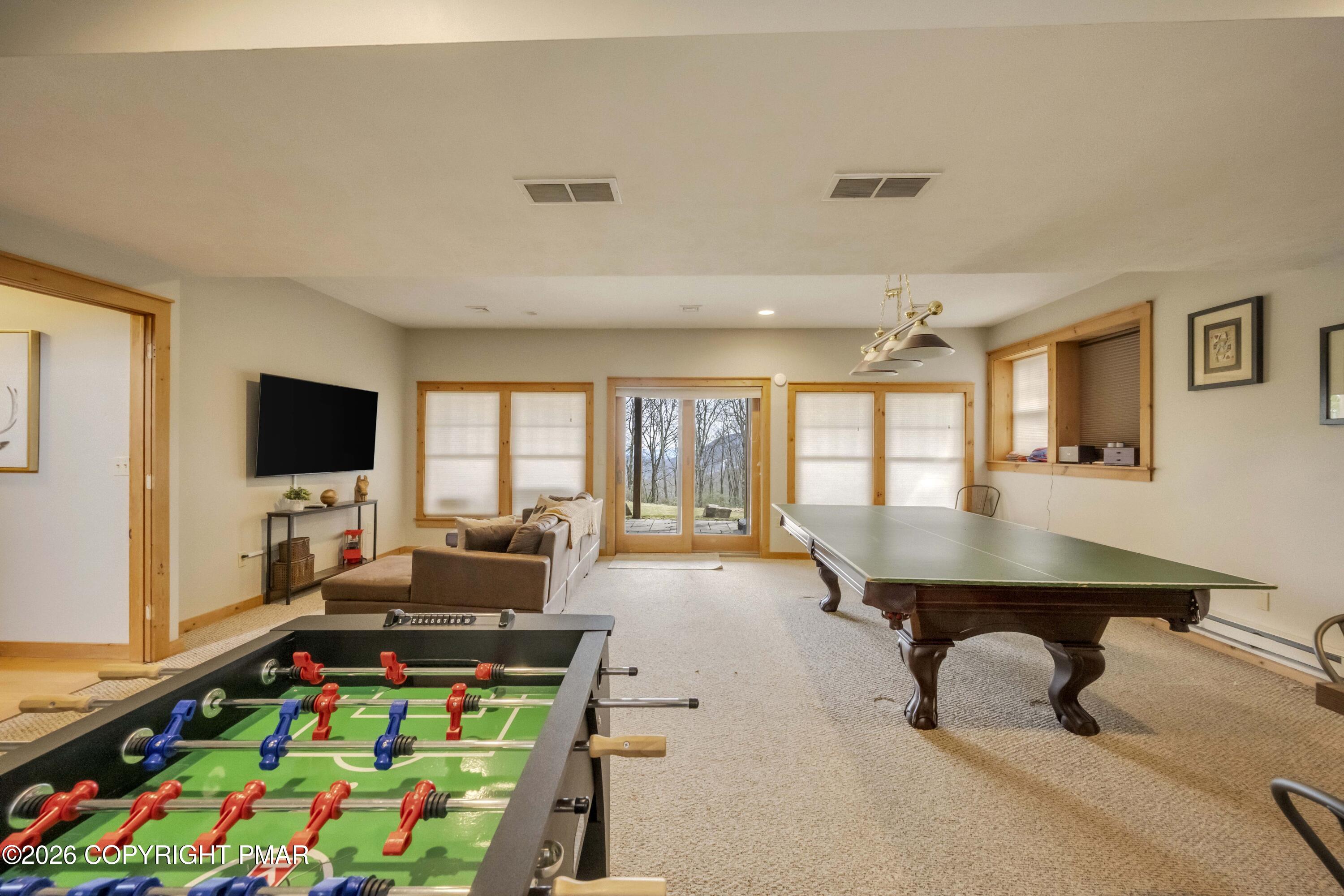 188 Upper Deer Valley Road Tannersville, PA 18372 - Photo 29 of 49 a room with furniture and large flat screen tv