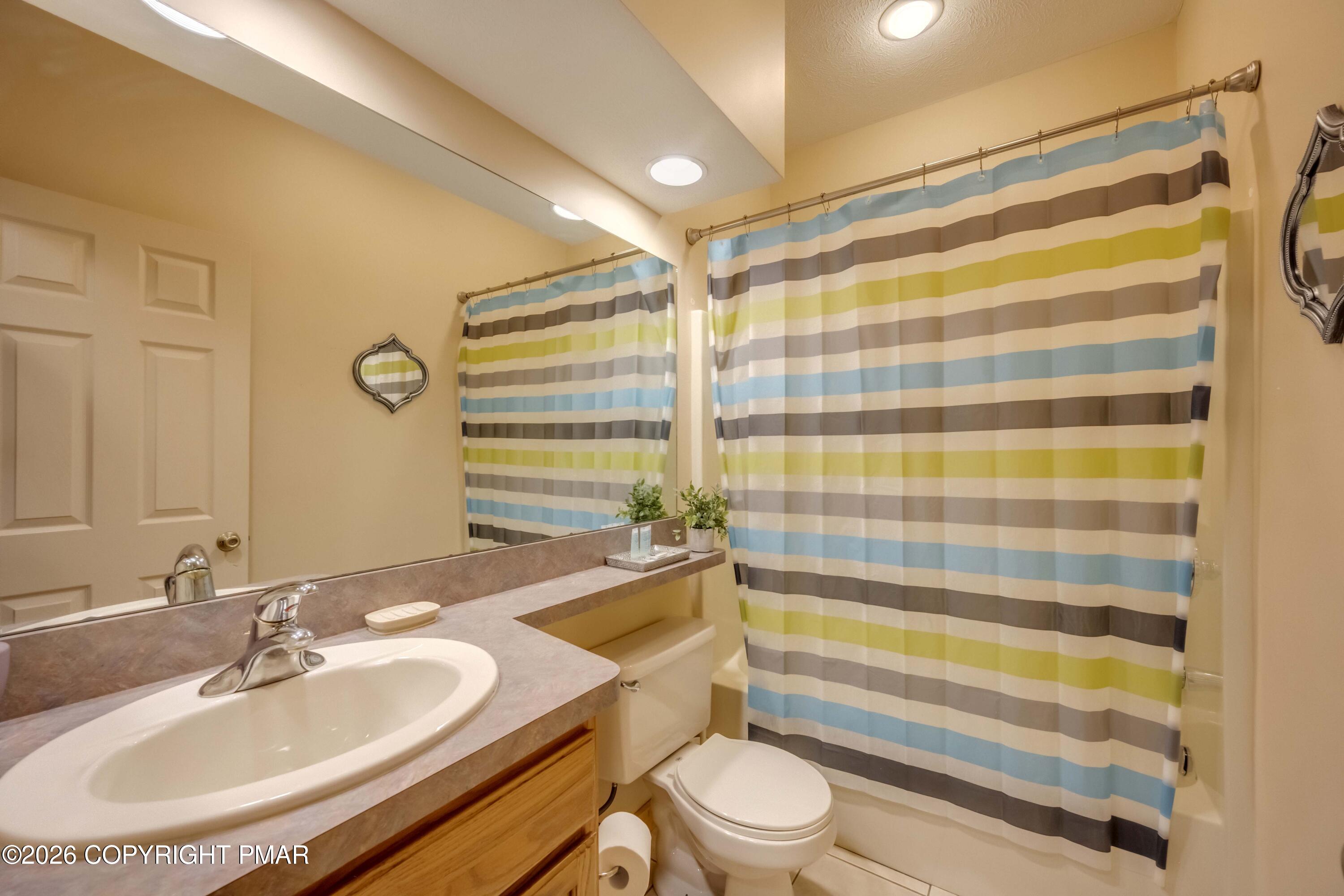 188 Upper Deer Valley Road Tannersville, PA 18372 - Photo 36 of 49 a bathroom with a sink and a mirror