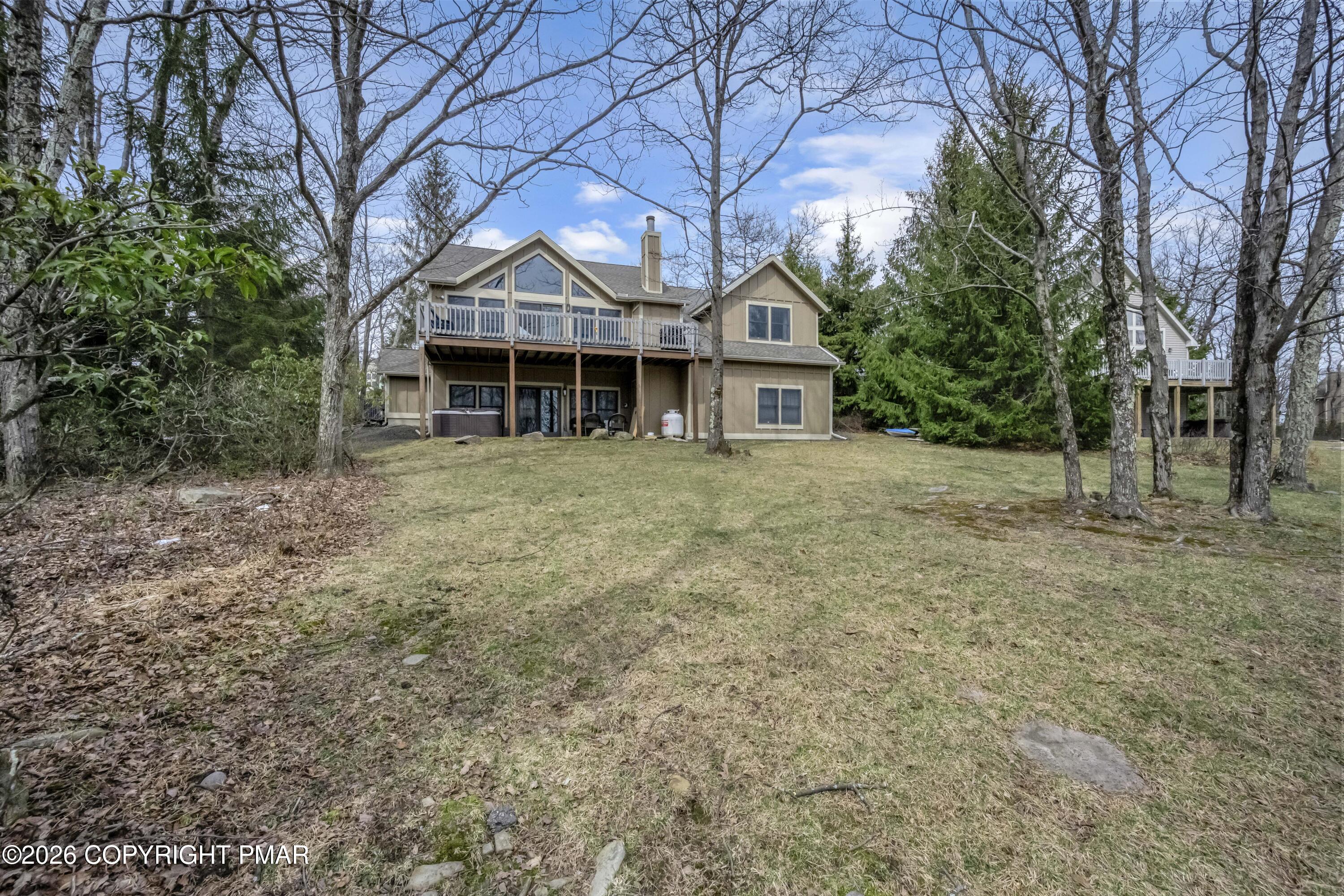 188 Upper Deer Valley Road Tannersville, PA 18372 - Photo 4 of 49 a front view of a house with a garden