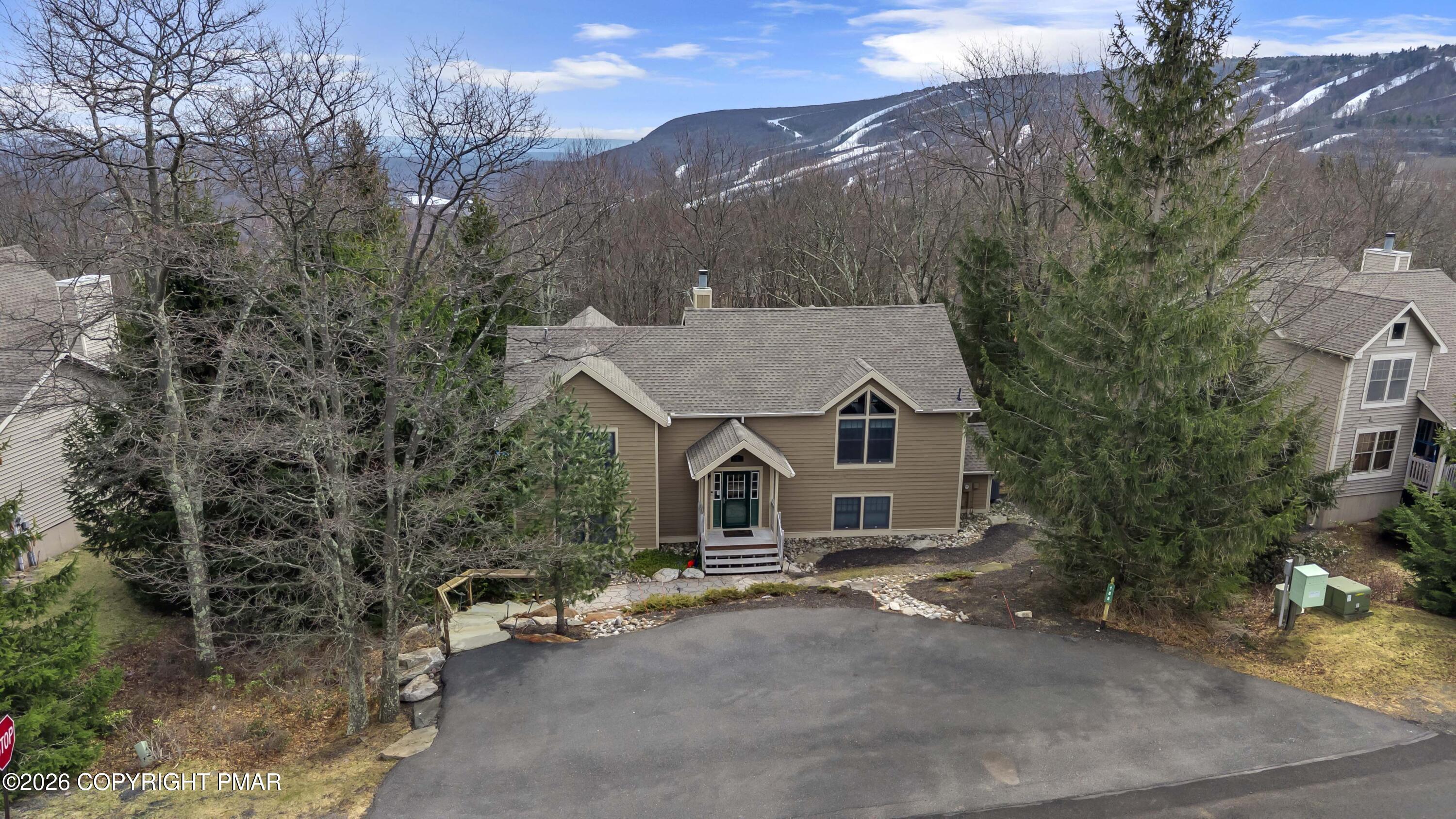 188 Upper Deer Valley Road Tannersville, PA 18372 - Photo 44 of 49 front view of a house with a street