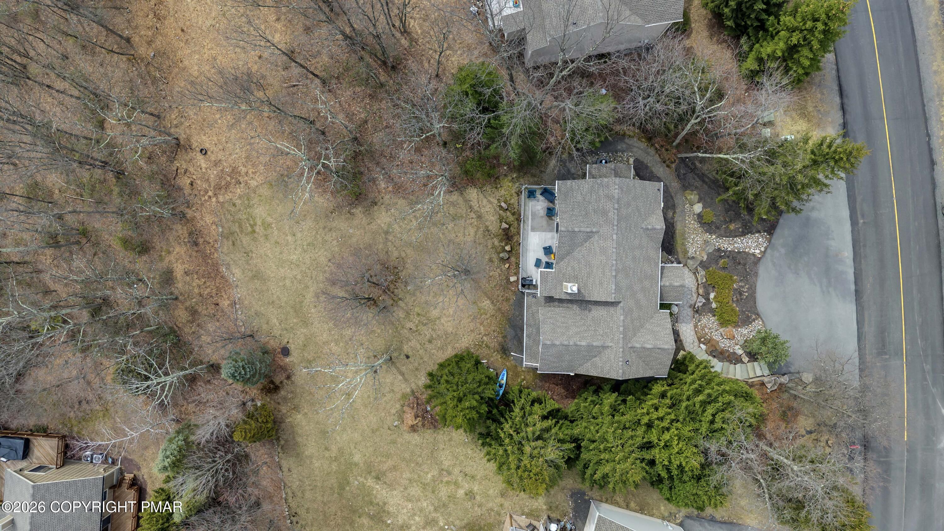 188 Upper Deer Valley Road Tannersville, PA 18372 - Photo 46 of 49 an aerial view of a house with a yard and trees