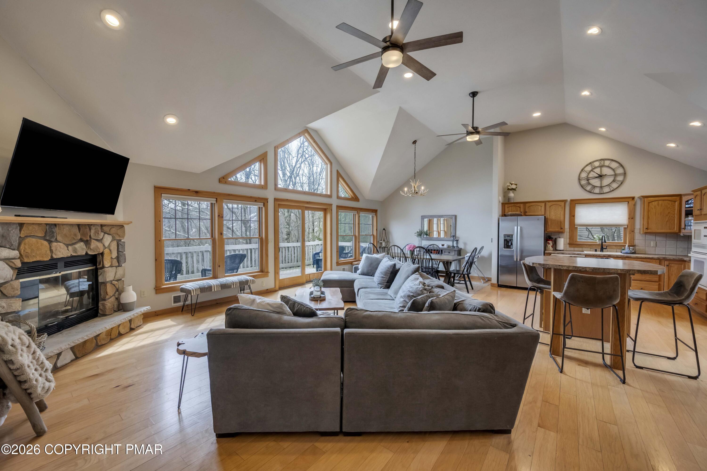 188 Upper Deer Valley Road Tannersville, PA 18372 - Photo 8 of 49 a living room with fireplace furniture and a flat screen tv