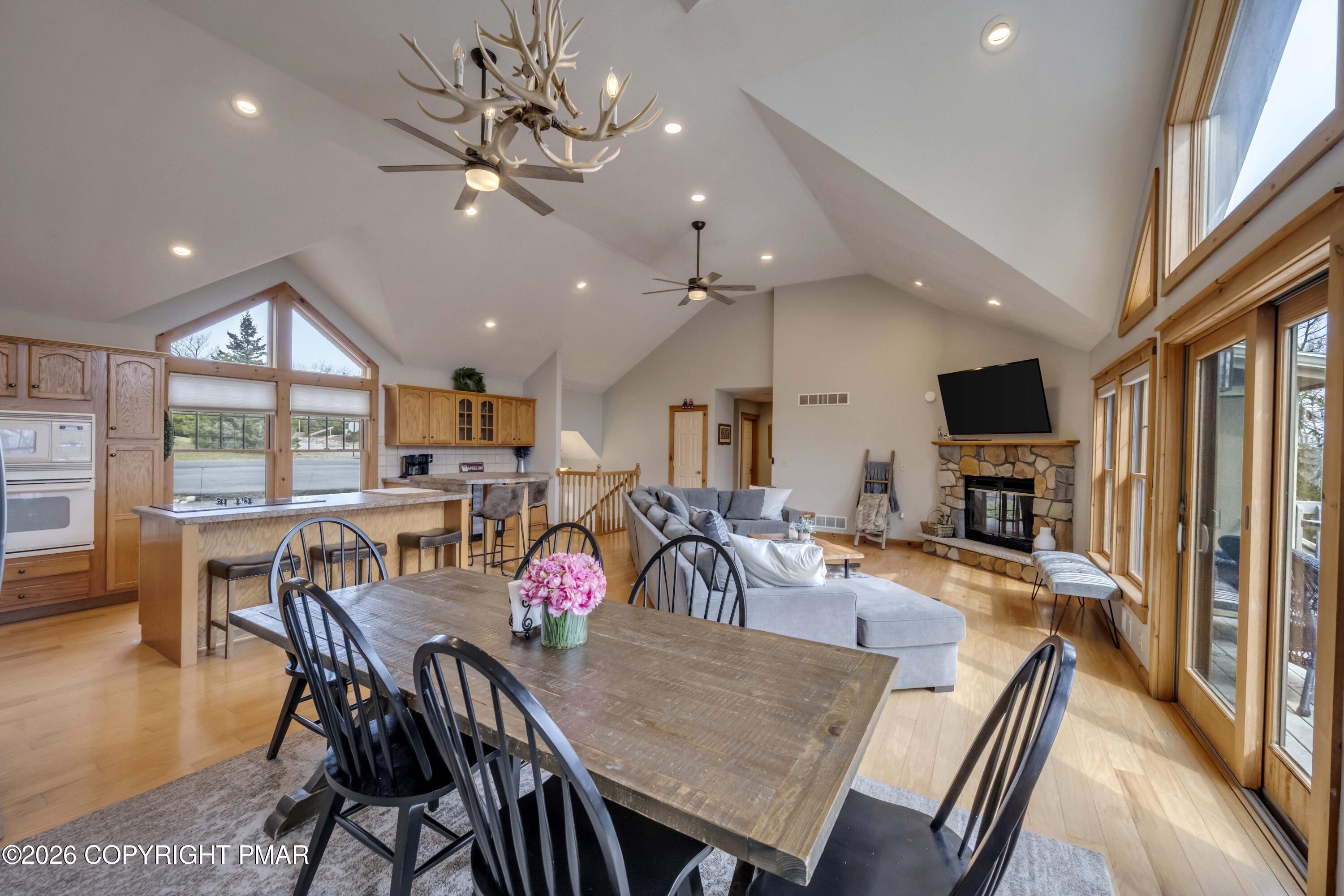188 Upper Deer Valley Road Tannersville, PA 18372 - Photo 10 of 49 a view of a dining room with furniture window and wooden floor