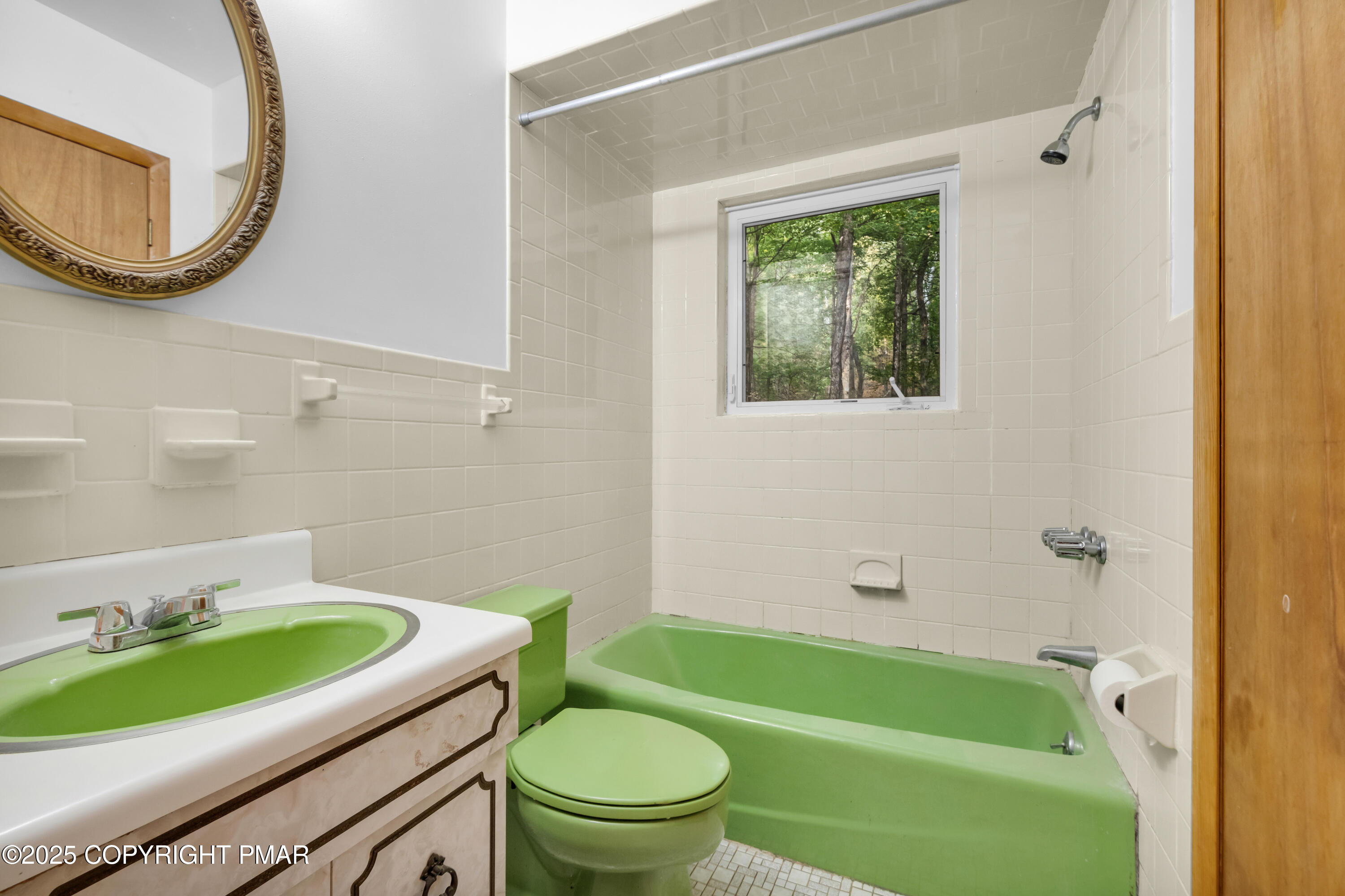 326 Otter Court Bushkill, PA 18324 - Photo 20 of 47 a bathroom with a sink a toilet a bathtub and a shower