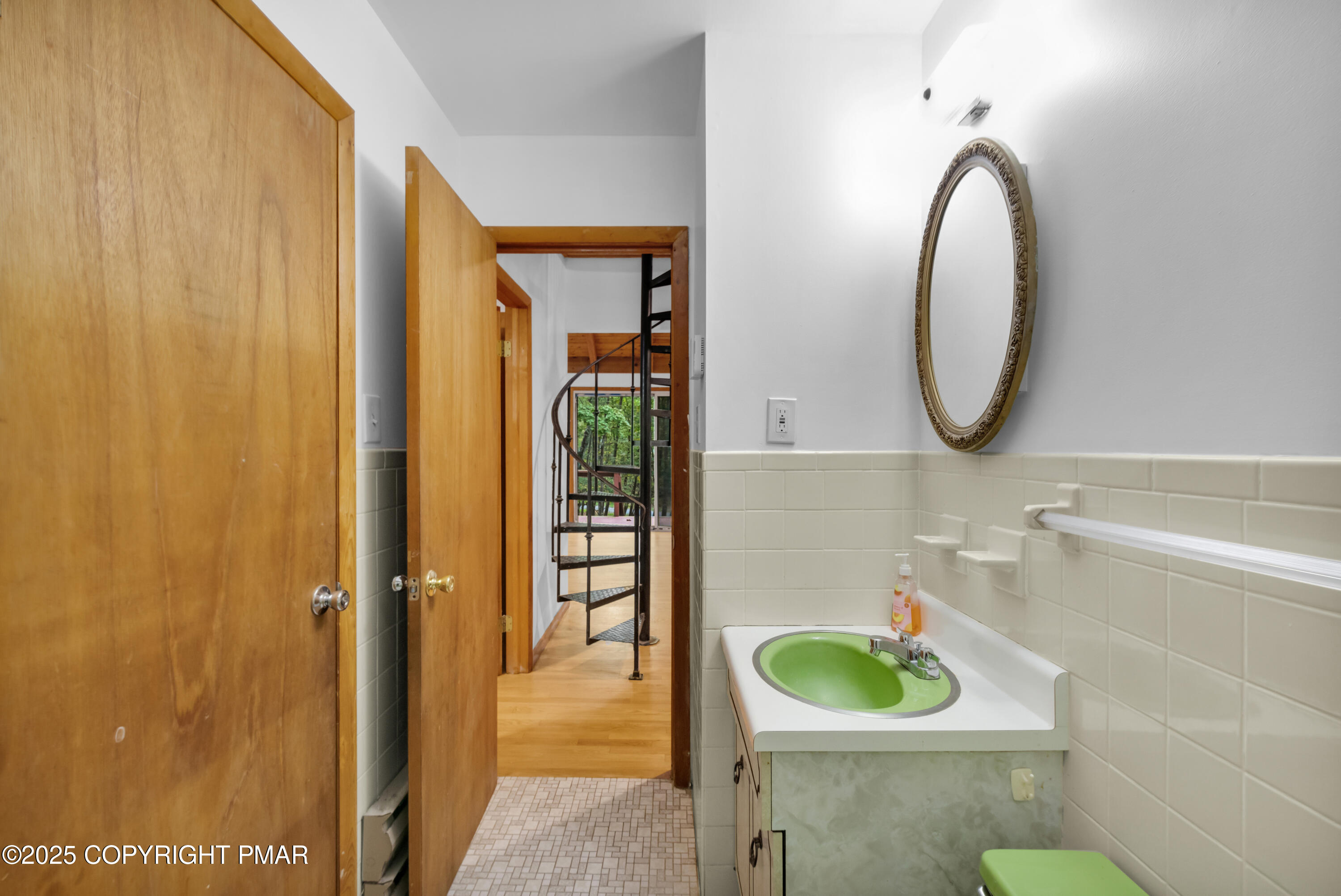 326 Otter Court Bushkill, PA 18324 - Photo 21 of 47 a bathroom with a sink and a mirror