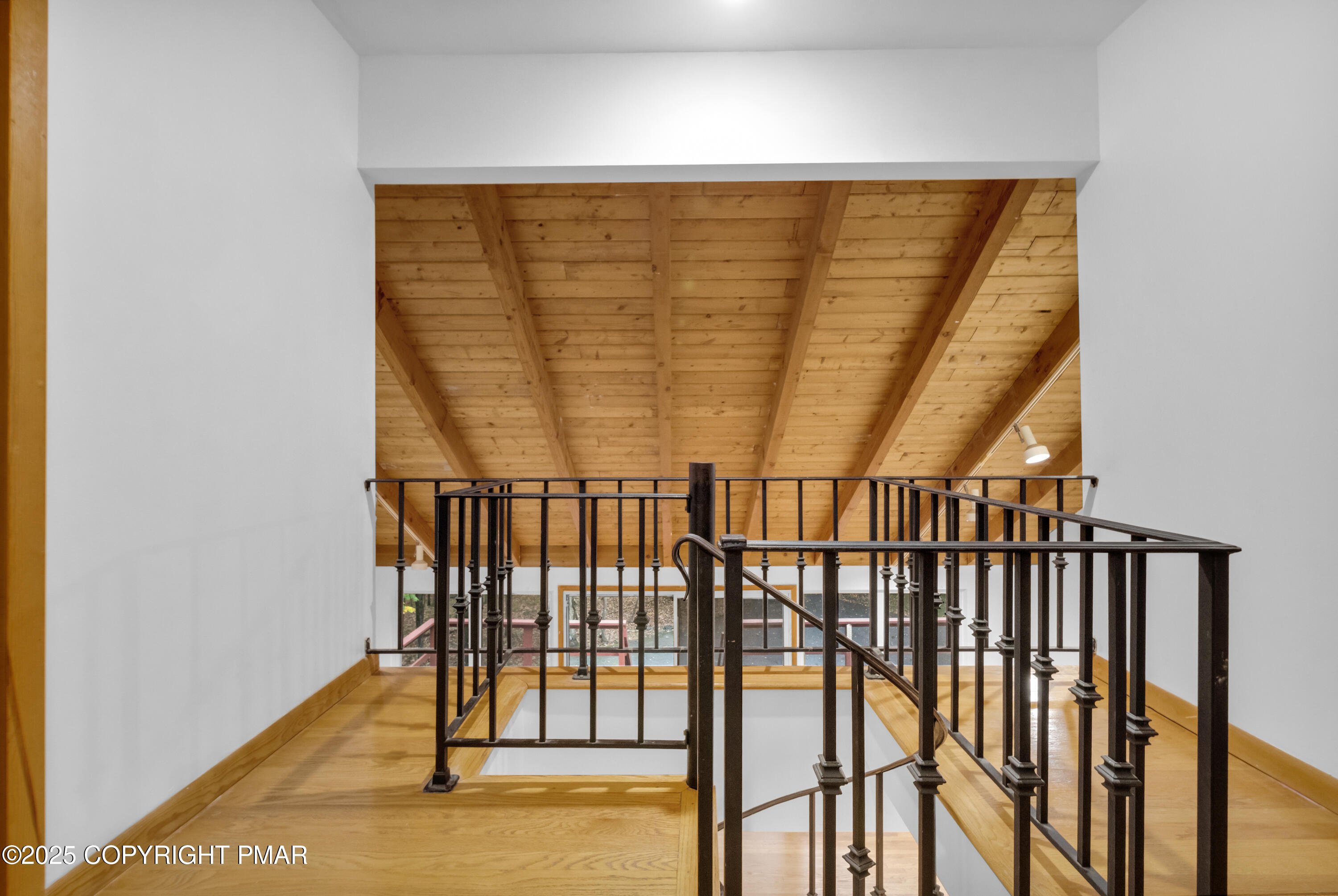 326 Otter Court Bushkill, PA 18324 - Photo 24 of 47 a view of staircase with a floor to ceiling window and stairs