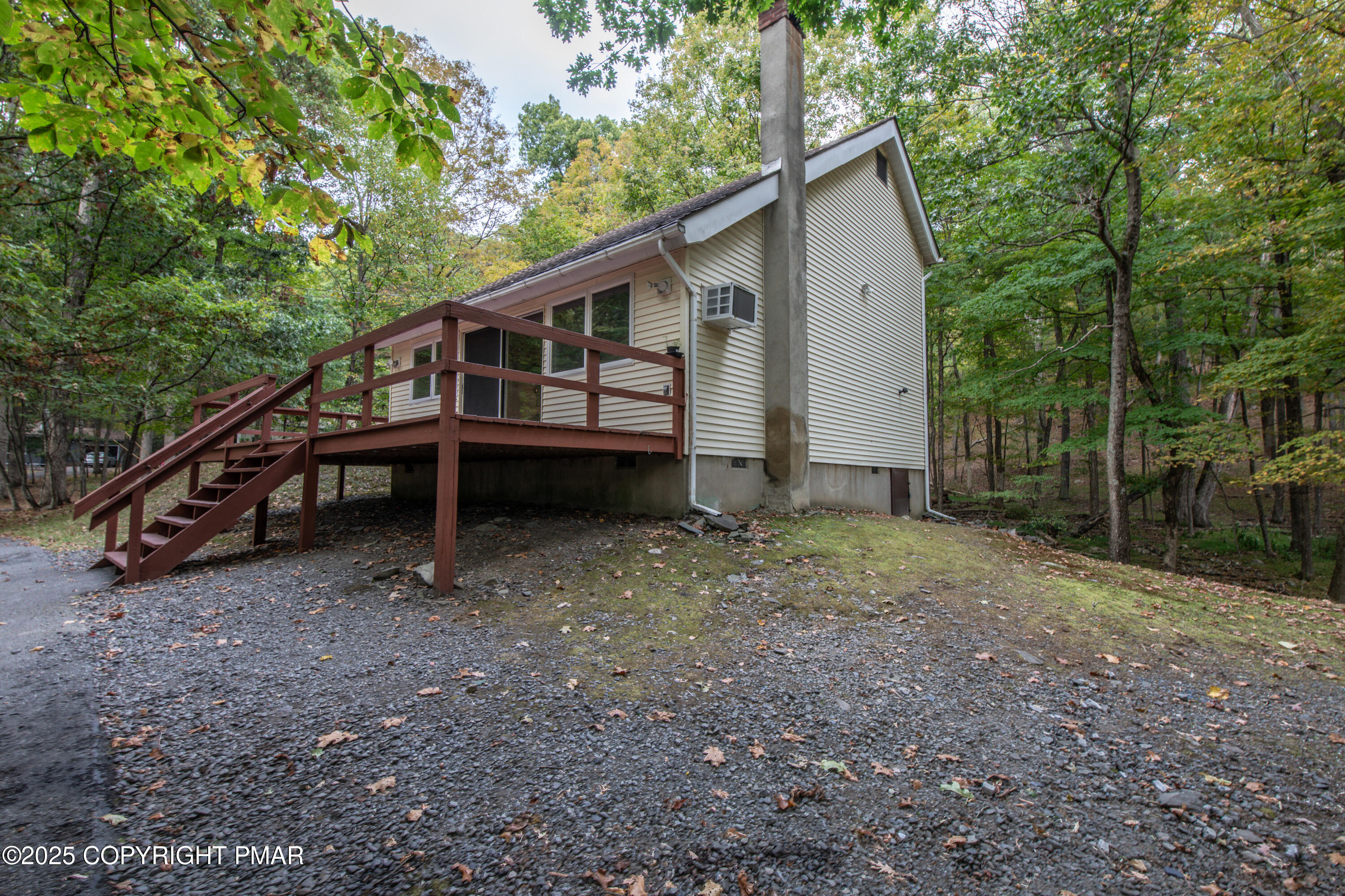 326 Otter Court Bushkill, PA 18324 - Photo 3 of 47 a view of a house with a yard and sitting area