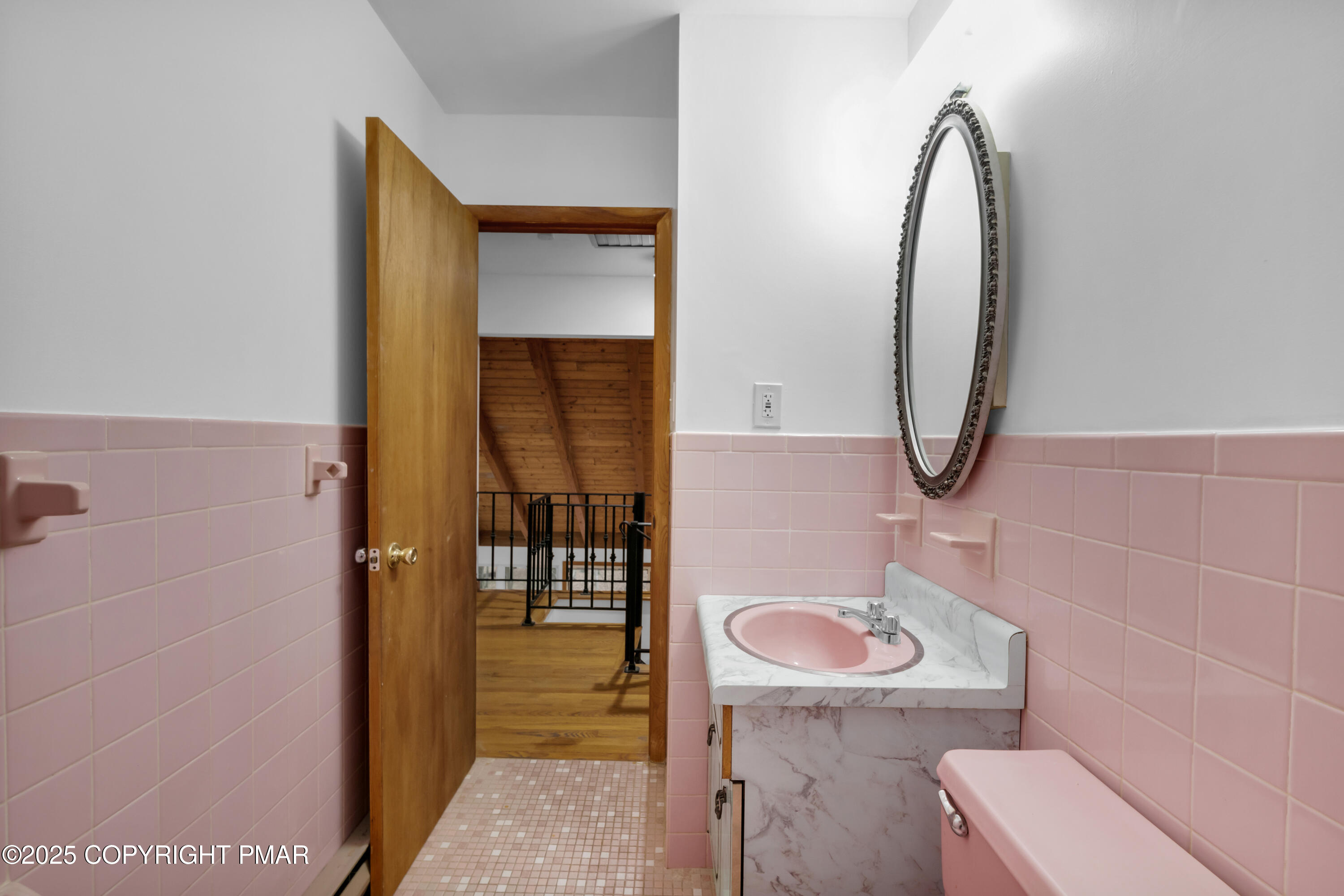 326 Otter Court Bushkill, PA 18324 - Photo 31 of 47 a bathroom with a sink a toilet and mirror