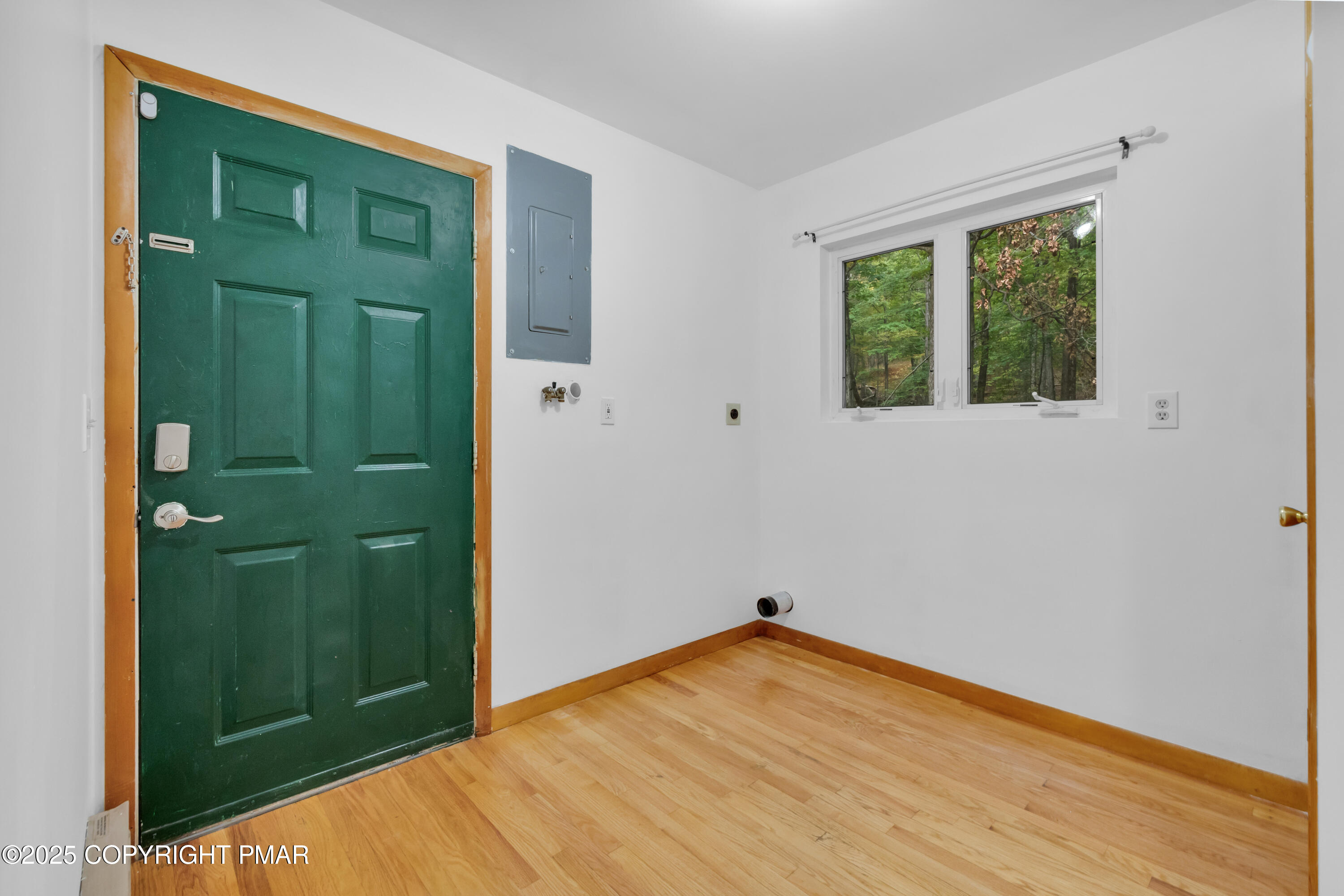 326 Otter Court Bushkill, PA 18324 - Photo 33 of 47 wooden floor in an empty room with a window