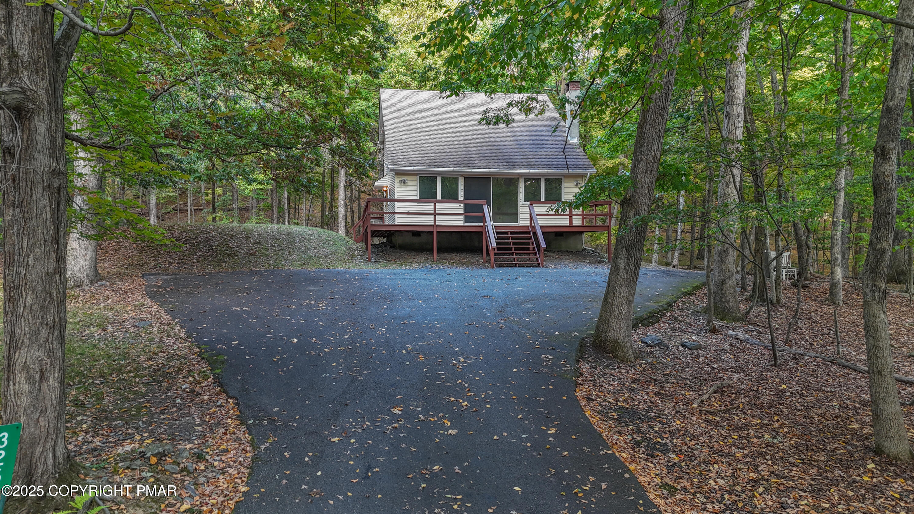 326 Otter Court Bushkill, PA 18324 - Photo 41 of 47 a view of a house with a yard siting area and garden