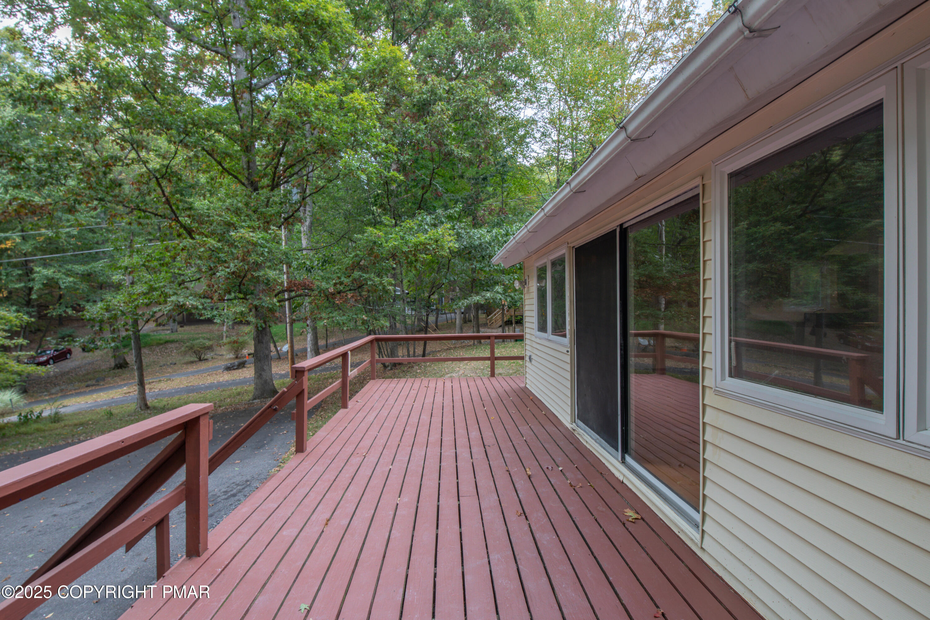 326 Otter Court Bushkill, PA 18324 - Photo 8 of 47 a view of balcony with wooden floor and outdoor space