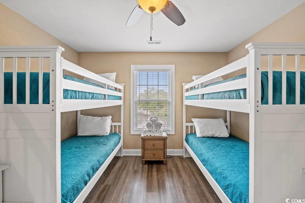 520 Caribbean Way Myrtle Beach, SC 29577 - Photo 16 of 21 Bedroom featuring wood finished floors and a ceiling fan