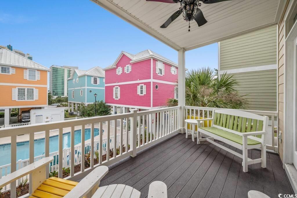 520 Caribbean Way Myrtle Beach, SC 29577 - Photo 19 of 21 Deck featuring a community pool and ceiling fan