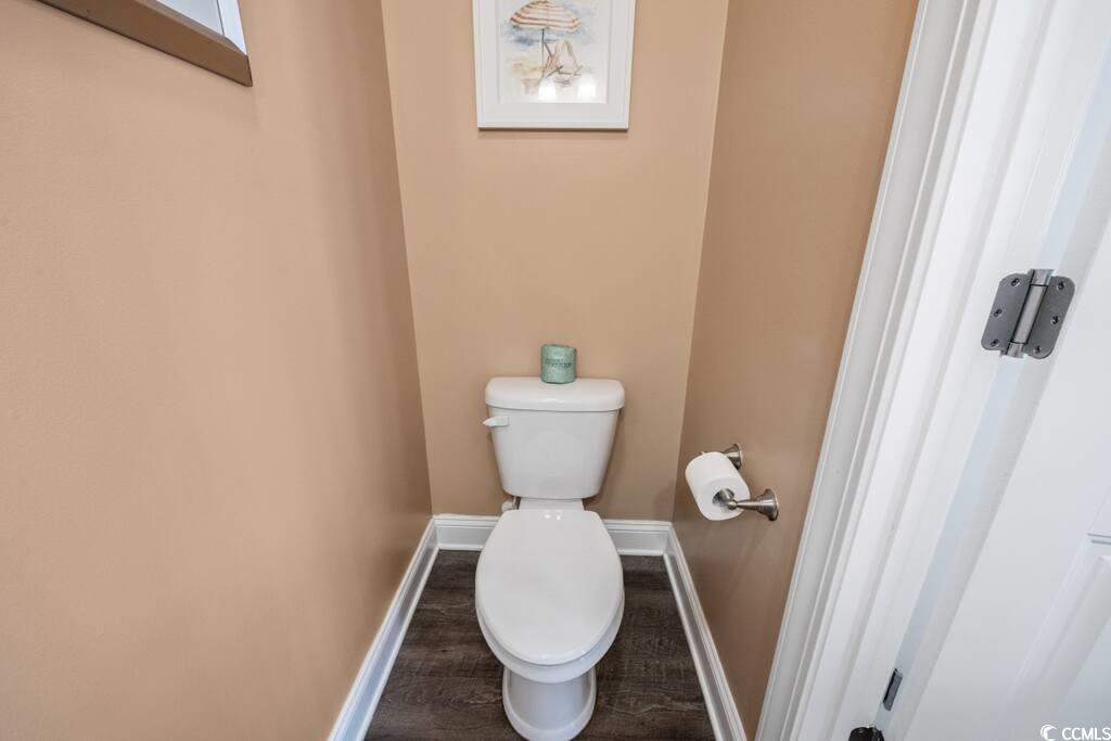 520 Caribbean Way Myrtle Beach, SC 29577 - Photo 9 of 21 Bathroom featuring baseboards and wood finished floors