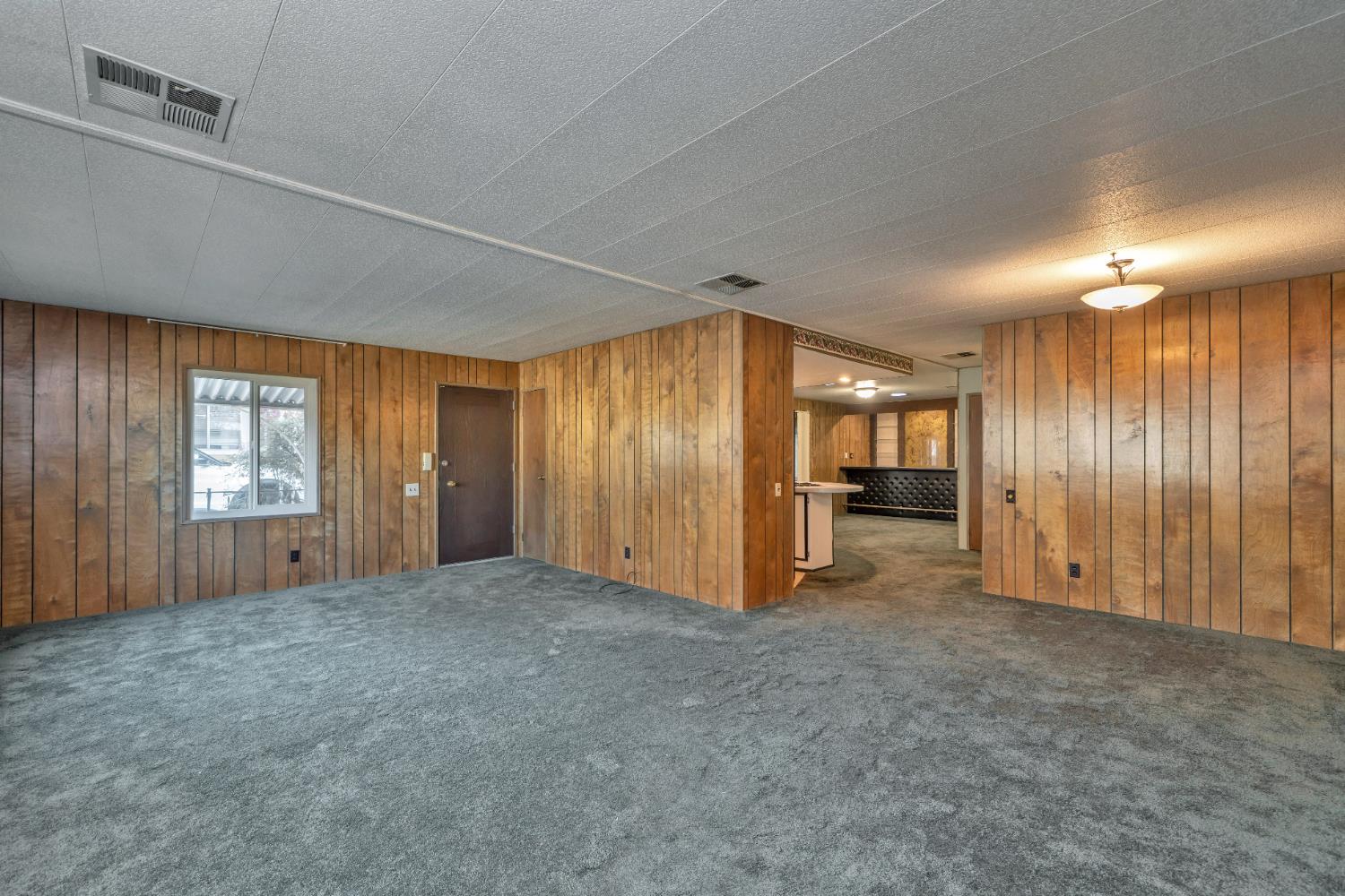 3550 China Garden Road, Unit 38 Placerville, CA 95667 - Photo 6 of 19 Large living room leading in to the dining room and kitchen