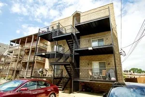a view of a car park in front of building