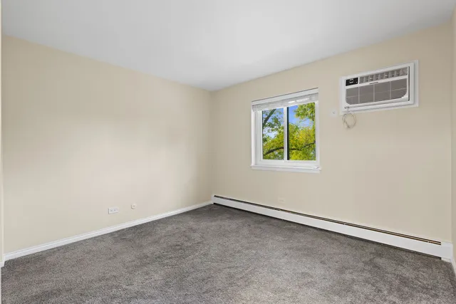 a view of an empty room and closet