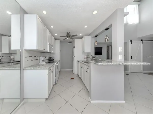 $489,000 | 1555 Tarpon Center Drive, Unit 255, Venice, FL 34285