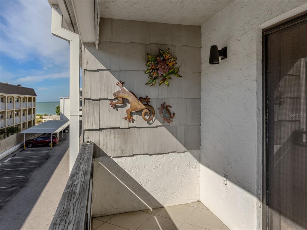 1555 Tarpon Center Drive, Unit 255 Venice, FL 34285 - Photo 28 of 57 a view of entryway and kitchen