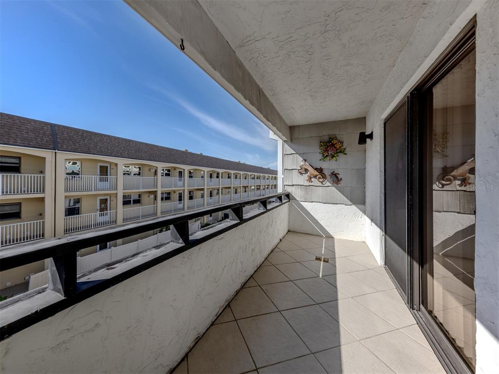 1555 Tarpon Center Drive, Unit 255 Venice, FL 34285 - Photo 29 of 57 a view of a balcony