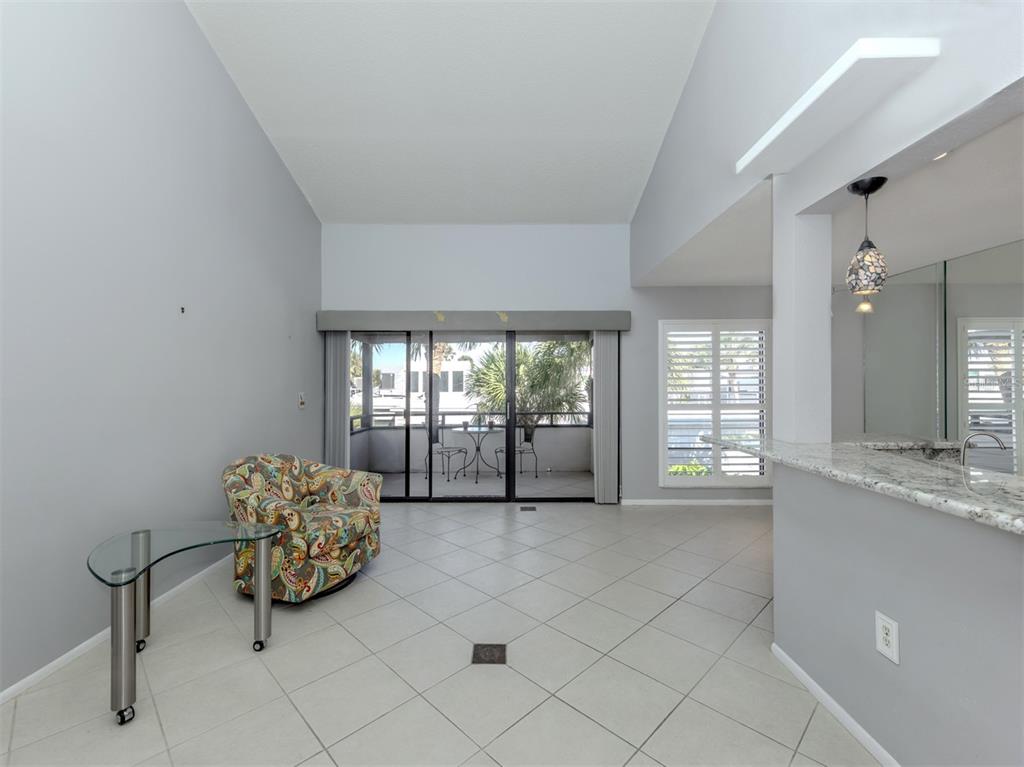1555 Tarpon Center Drive, Unit 255 Venice, FL 34285 - Photo 9 of 57 a room with natural light and window