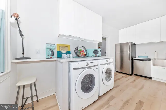a utility room with dryer and washer