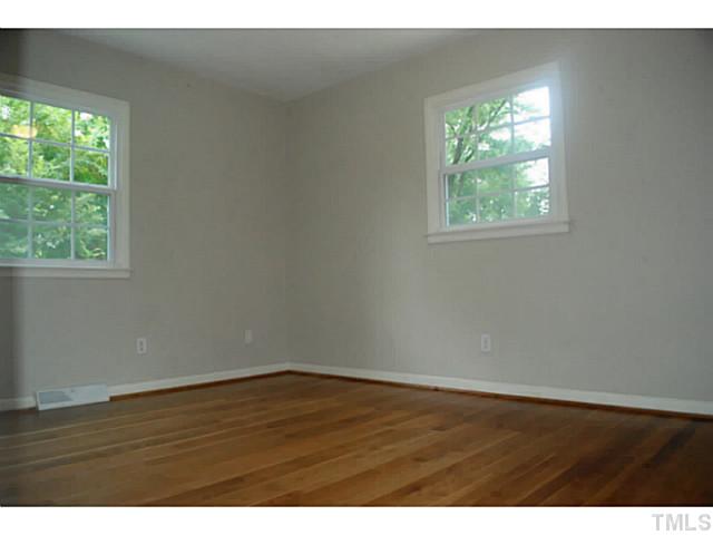 408 Latimer Road Raleigh, NC 27609 - Photo 12 of 24 Second bedroom on the first floor is located on the back of the home.