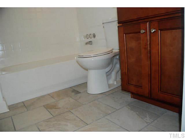 408 Latimer Road Raleigh, NC 27609 - Photo 16 of 24 Completed renovated with beautiful fixtures and tile.