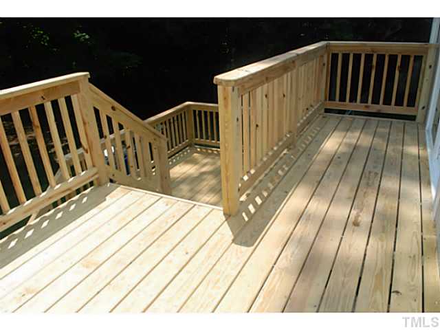 408 Latimer Road Raleigh, NC 27609 - Photo 19 of 24 Multi-level deck off the kitchen is perfect for grilling and large enough for your outdoor dining.