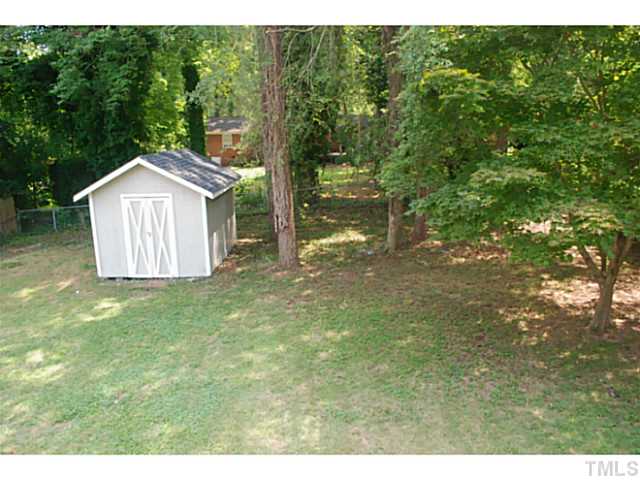 408 Latimer Road Raleigh, NC 27609 - Photo 22 of 24 Large private backyard is fenced.