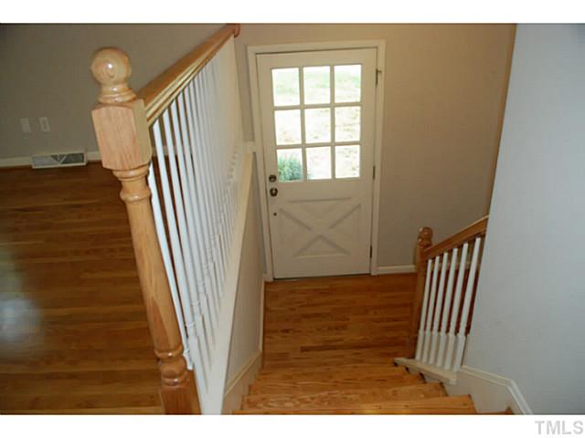408 Latimer Road Raleigh, NC 27609 - Photo 4 of 24 The split level foyer creates a dramatic entrance to this updated home.