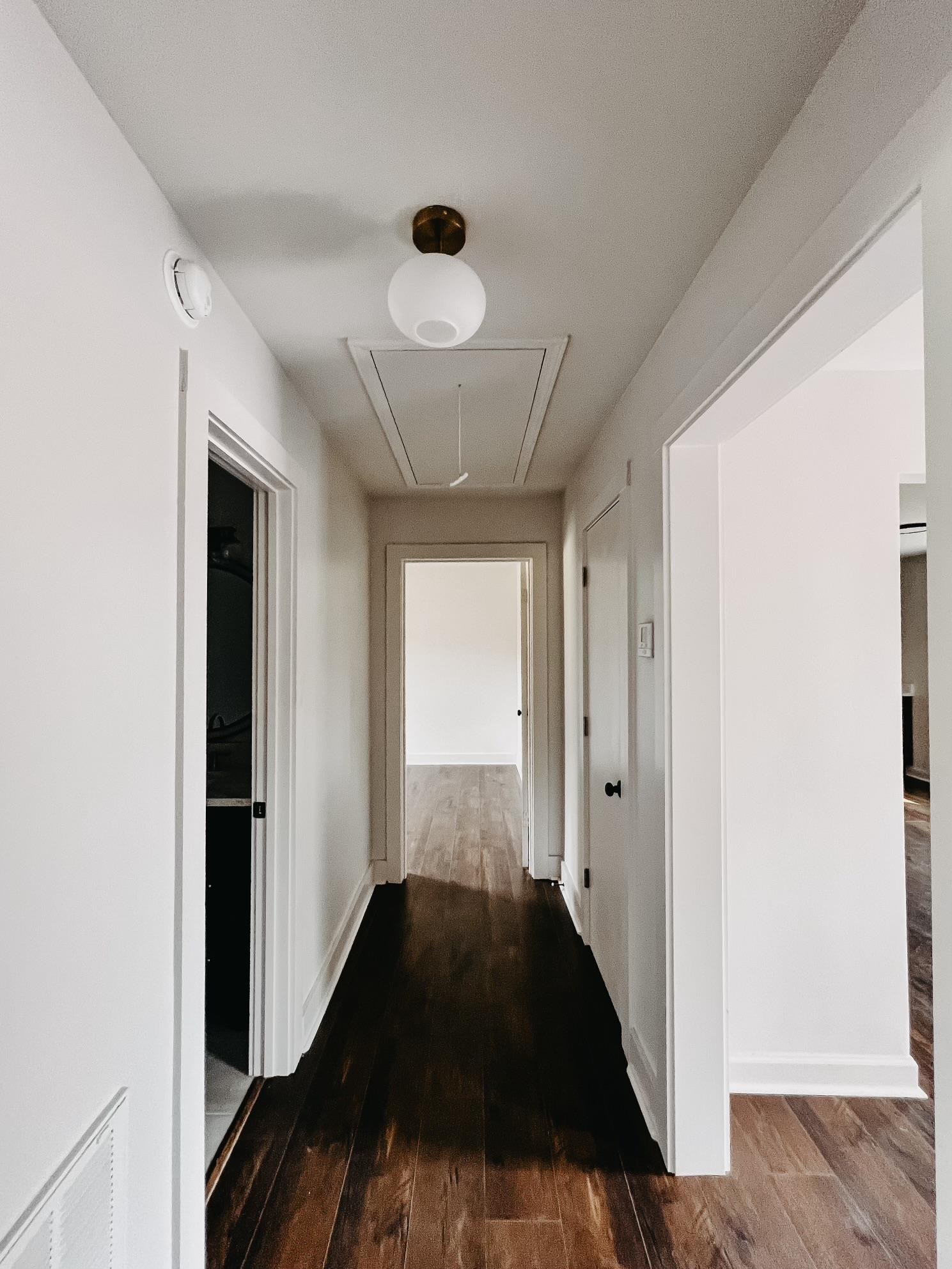 8523 Epperson Mill Road Millington, TN 38053 - Photo 13 of 24 Corridor featuring dark hardwood / wood-style flooring