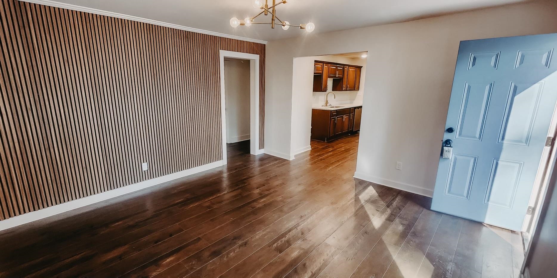 8523 Epperson Mill Road Millington, TN 38053 - Photo 5 of 24 Interior space featuring a notable chandelier, dark hardwood / wood-style floors, ornamental molding