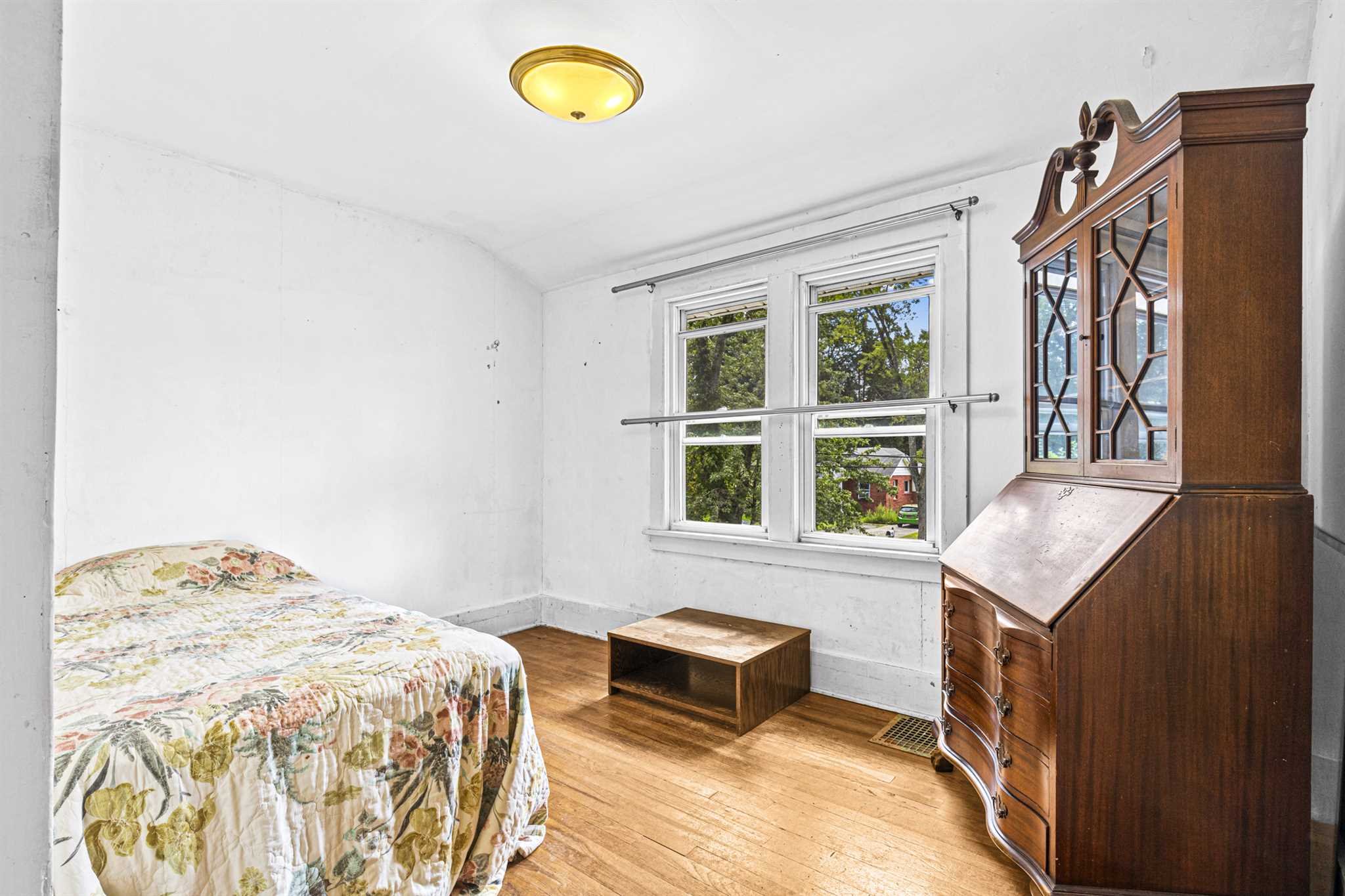 10 Townsend Boulevard Poughkeepsie, NY 12603 - Photo 9 of 15 a bedroom with a bed and a window