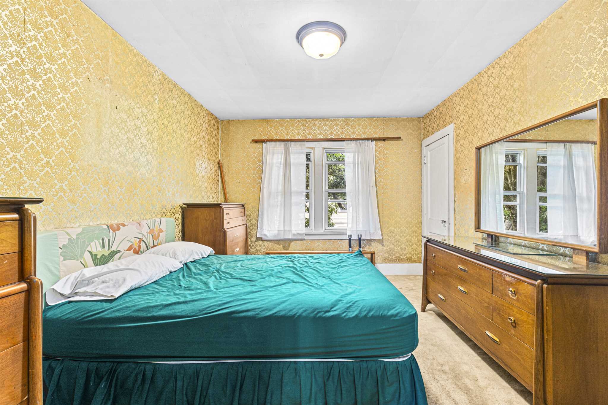 10 Townsend Boulevard Poughkeepsie, NY 12603 - Photo 10 of 15 a bedroom with a bed and a large window