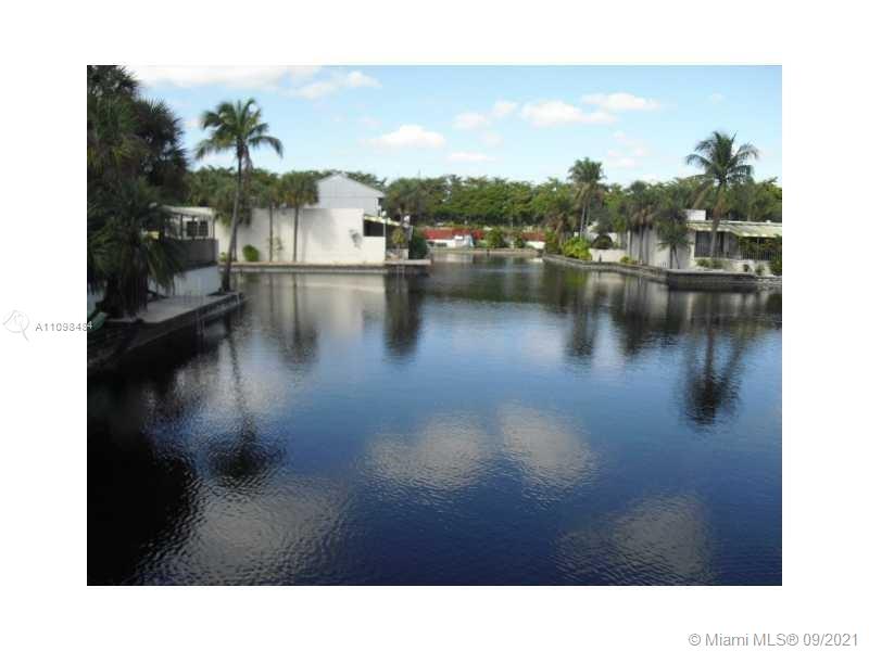 6427 Windmill Gate Road Miami Lakes, FL 33014 - Photo 1 of 34 a view of a lake