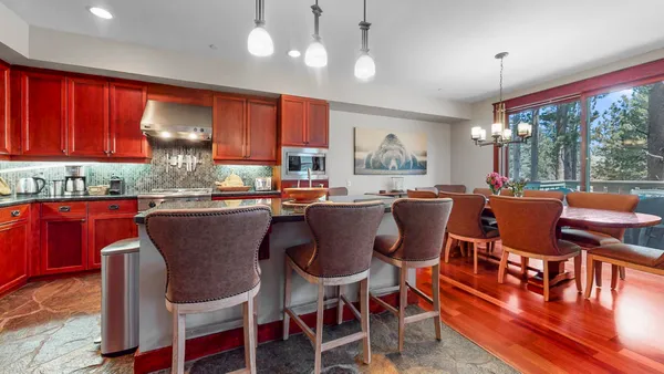 a kitchen with stove top oven stove and cabinets
