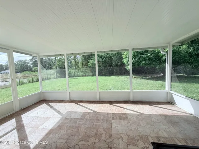a spacious bathroom with a large tub and shower